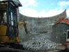 Parbold - Close up of wheeled excavator and long reach breaking out concrete.